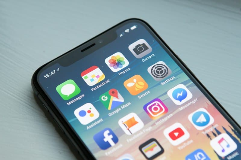 User interacting with a responsive mobile interface while testing network waterfall speed metrics